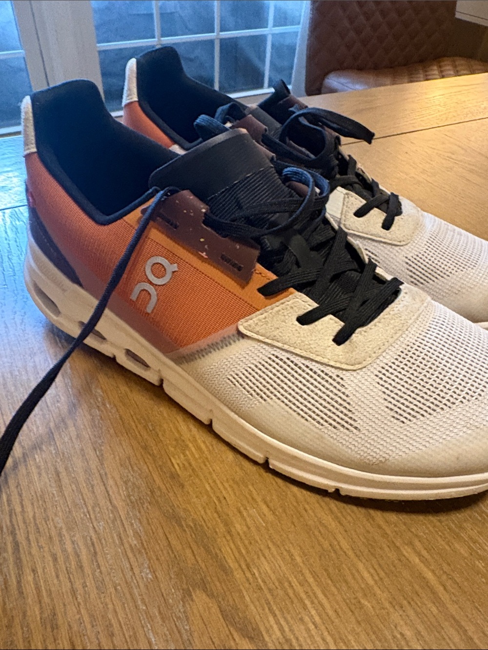On Running Women’s Athletic Sneakers in White, Orange and Black